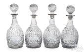 SET OF FOUR BLOWN CLEAR GLASS