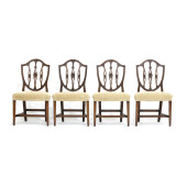 SET OF FOUR CARVED MAHOGANY HE