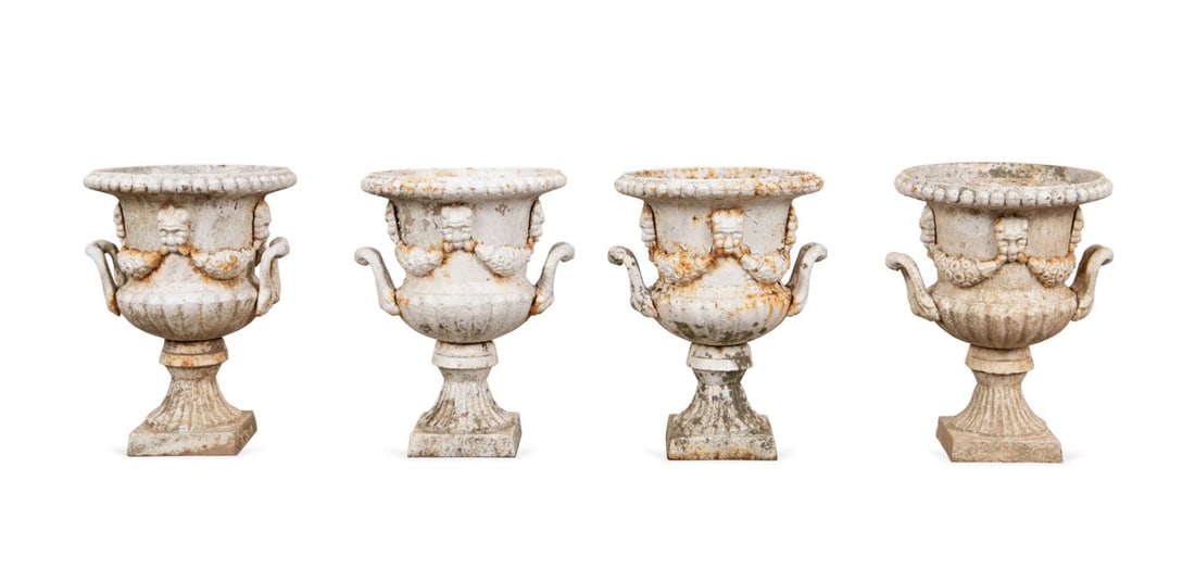 SET OF FOUR CLASSICAL STYLE IRON