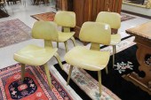 SET OF FOUR EAMES 'DCW' CHAIRS