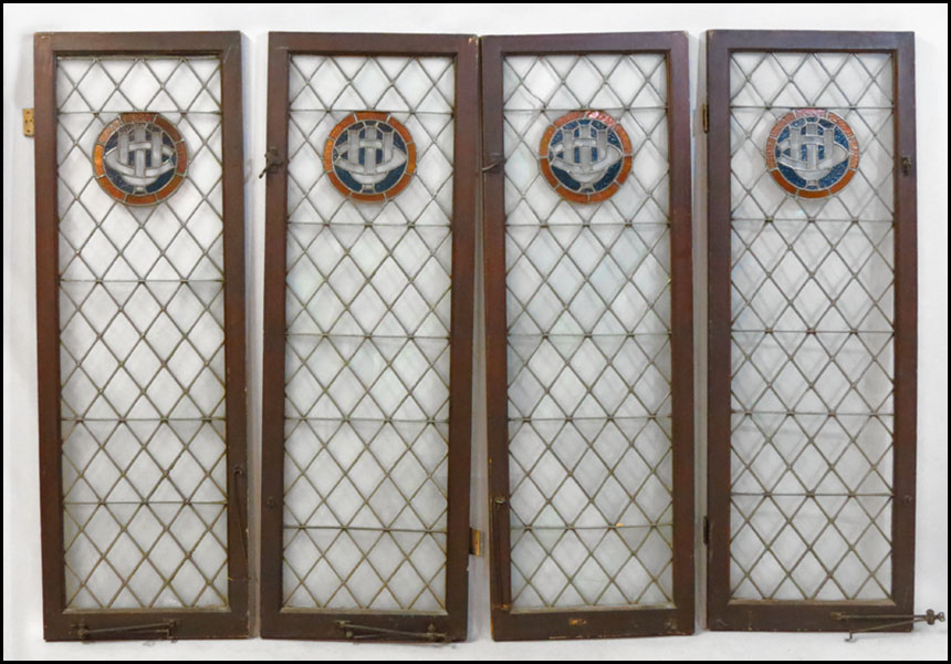 SET OF FOUR LEADED GLASS WINDOWS.