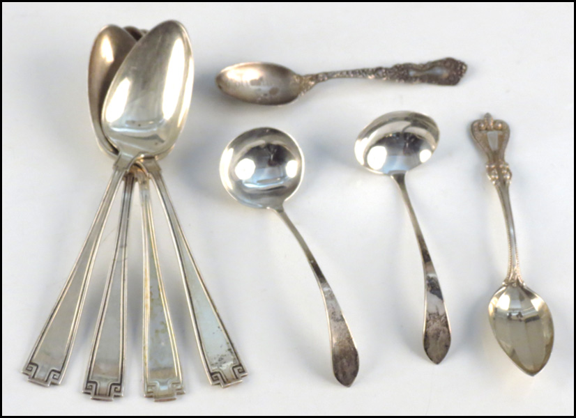 SET OF FOUR STERLING SILVER SPOONS.
