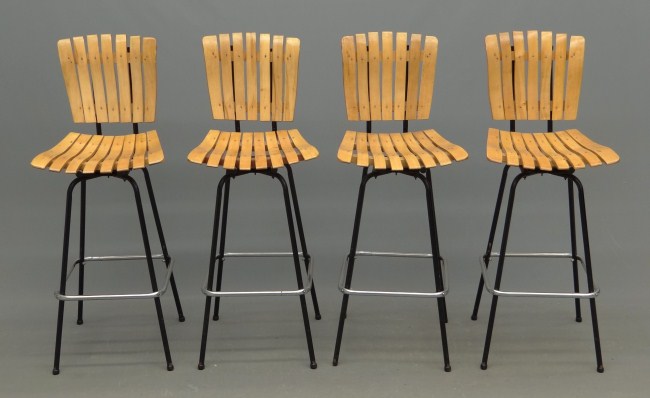 Set of four swivel stools. 43'' Ht.