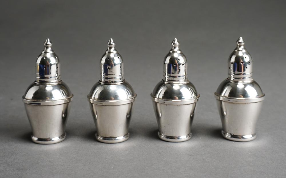 SET OF FOUR WEIGHTED STERLING
