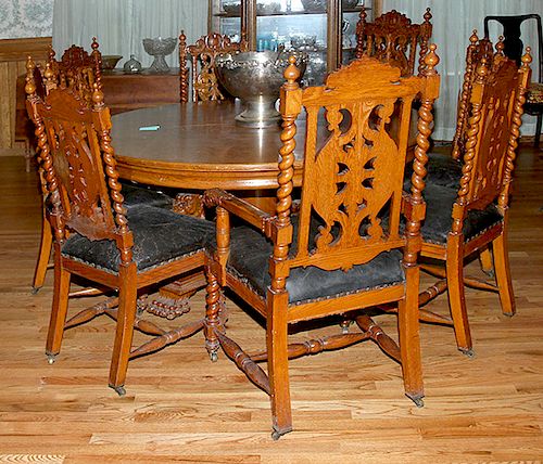SET OF HEAVILY CARVED OAK CHAIRSA