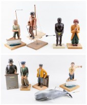 SET OF NINE FOLK ART CARVED WO