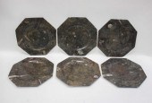 SET OF SIX CARVED FOSSIL SERVI