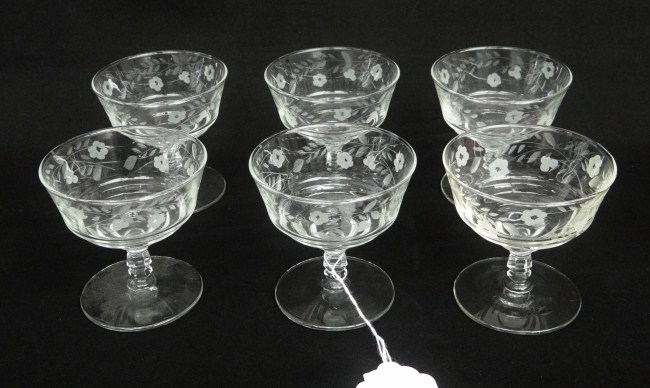 Set of six etched stemware glasses.