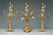 Set of three bronze candelabra