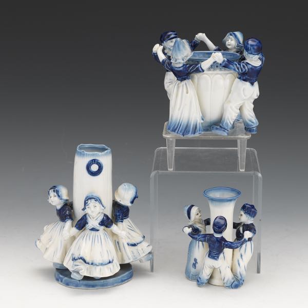 SET OF THREE DELFT FIGURAL VASES