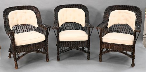 SET OF THREE WICKER ARM CHAIRSSet