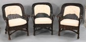 SET OF THREE WICKER ARM CHAIRS