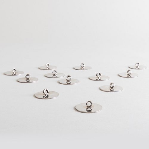 SET OF TWELVE CARTIER SILVER