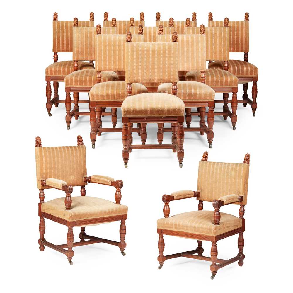 SET OF TWELVE CARVED OAK DINING