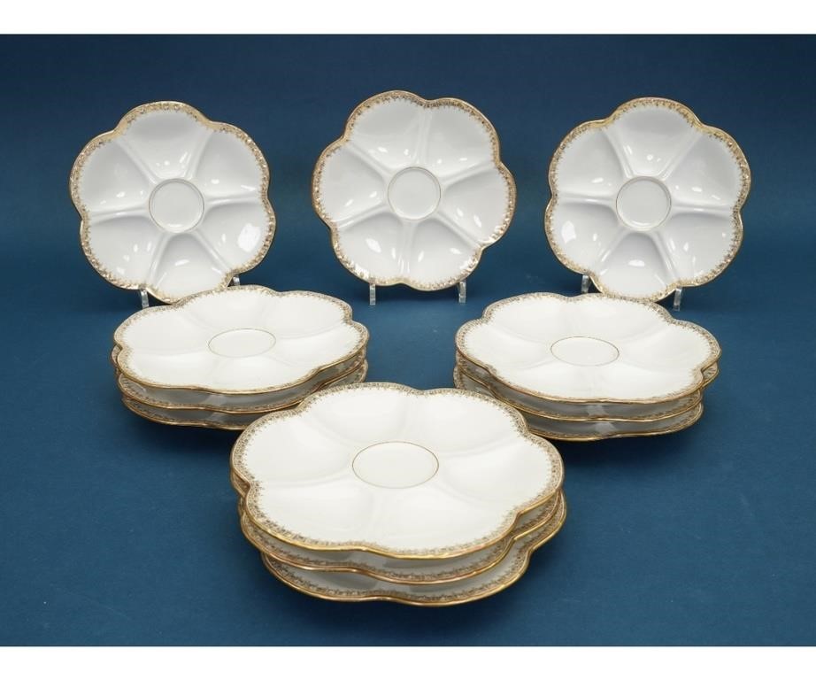 Set of twelve Limoges oyster plates