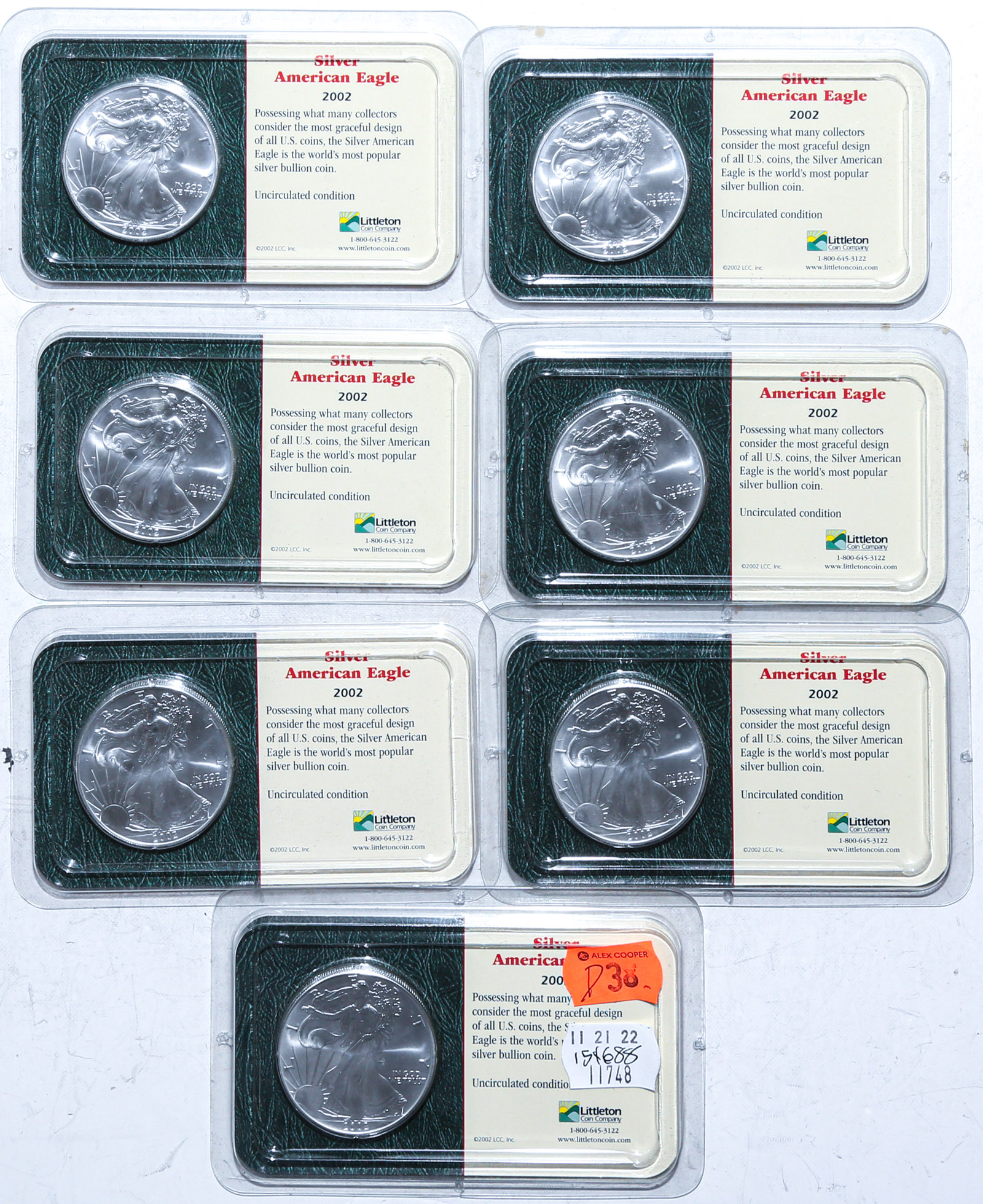 SEVEN 2002 SILVER EAGLES IN