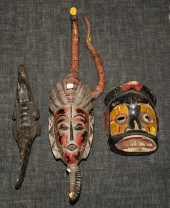 SEVEN AFRICAN CARVED WOOD ARTI