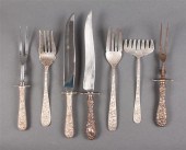 Seven American repousse sterli