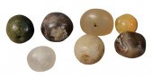 SEVEN ANCIENT CARVED STONE SEA