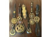 Seven antique leather and bras