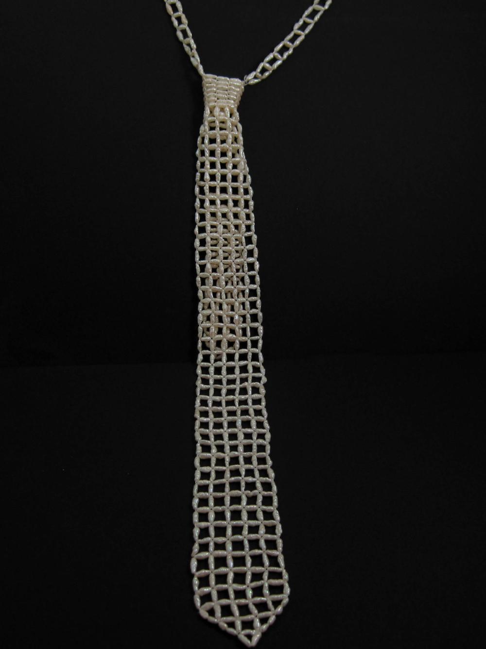 SEVEN ARTICLES OF WHITE PEARL