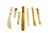 SEVEN ASIAN CARVED PAGE TURNER