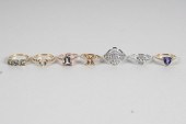 SEVEN ASSORTED 10 KARAT & DIAM