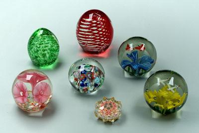 Seven assorted paperweights: one
