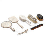SEVEN ASSORTED SILVER DRESSING