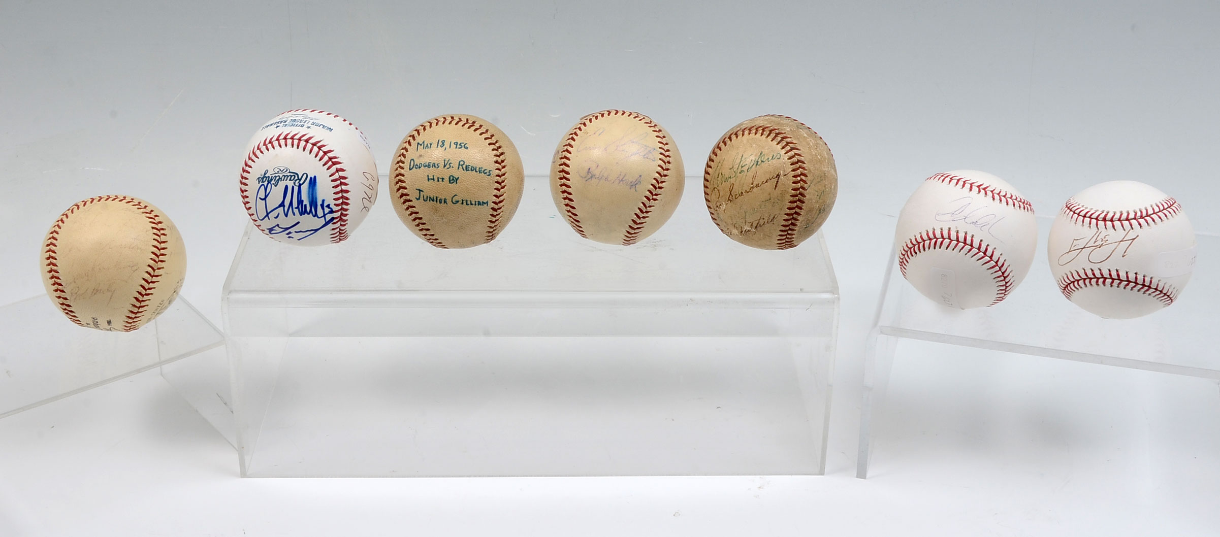SEVEN AUTOGRAPHED BASEBALLS: Six
