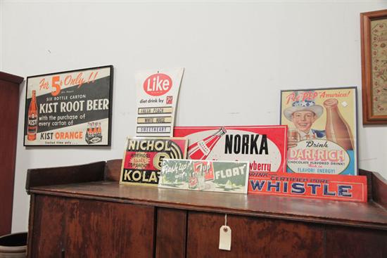 SEVEN BEVERAGE ADVERTISING SIGNS.