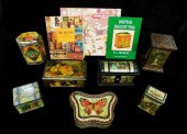 SEVEN BISCUIT TINS WITH THREE