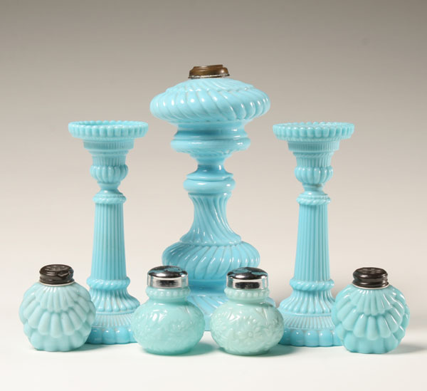 Seven blue milk glass items;