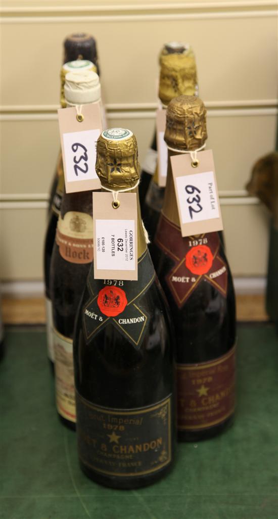 Seven bottles including five