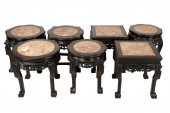 SEVEN CARVED WOOD TABORETScomp