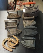 SEVEN CAST IRON FLAT IRONS AND