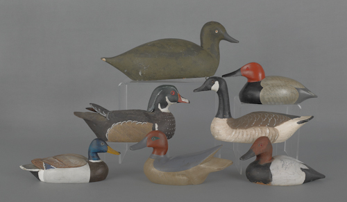 Seven contemporary carved and