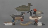 Seven contemporary carved and