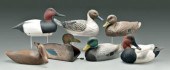 Seven duck decoys: stained woo