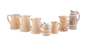 SEVEN FAUX BOIS JUGS AND TANKA