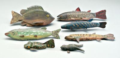 Seven fish and frog decoys: five
