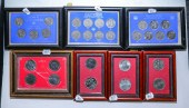 SEVEN FRAMED SETS OF UK CROWNS