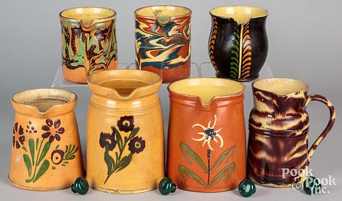 SEVEN FRENCH REDWARE PITCHERS, 19TH
