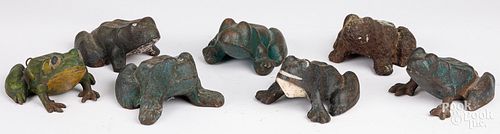 SEVEN FROG DOORSTOPSSeven cast iron