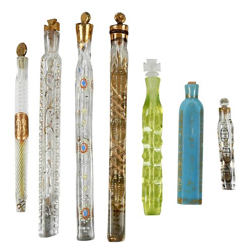 SEVEN GILT PAINTED GLASS LAY DOWN