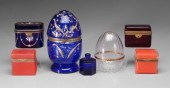 Seven glass containers: one wi