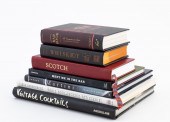 SEVEN HARDCOVER BOOKS ON COCKT