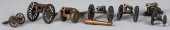 SEVEN IRON AND BRASS TOY CANNO