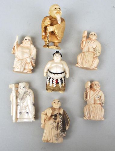 SEVEN JAPANESE CARVED FIGURAL