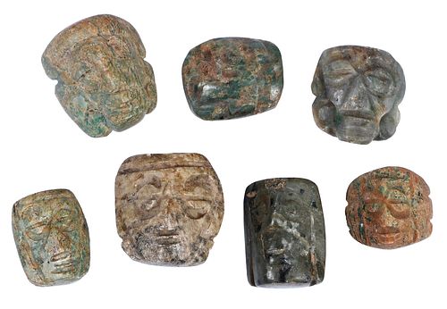 SEVEN MESOAMERICAN CARVED JADE MASK
